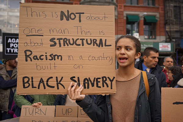 woman with protest sign