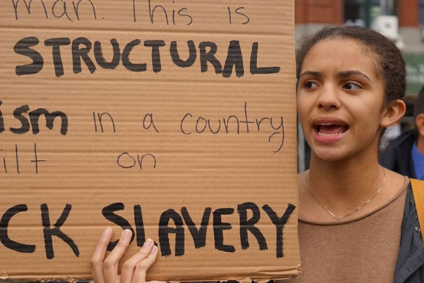 protester holding sign