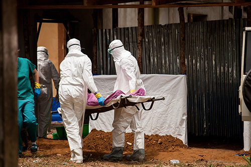 body being carried on stretcher