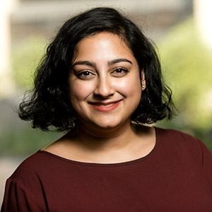 Manami Bhattacharya smiling.