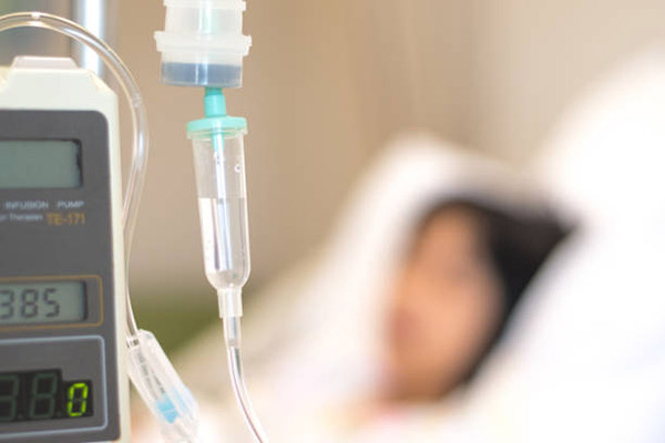 child in hospital bed