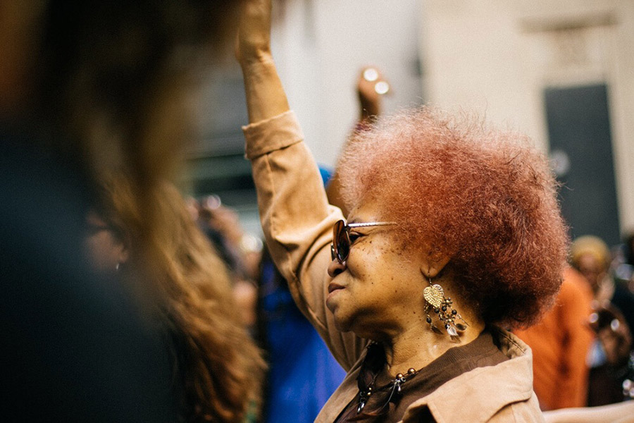 person with their arm raised