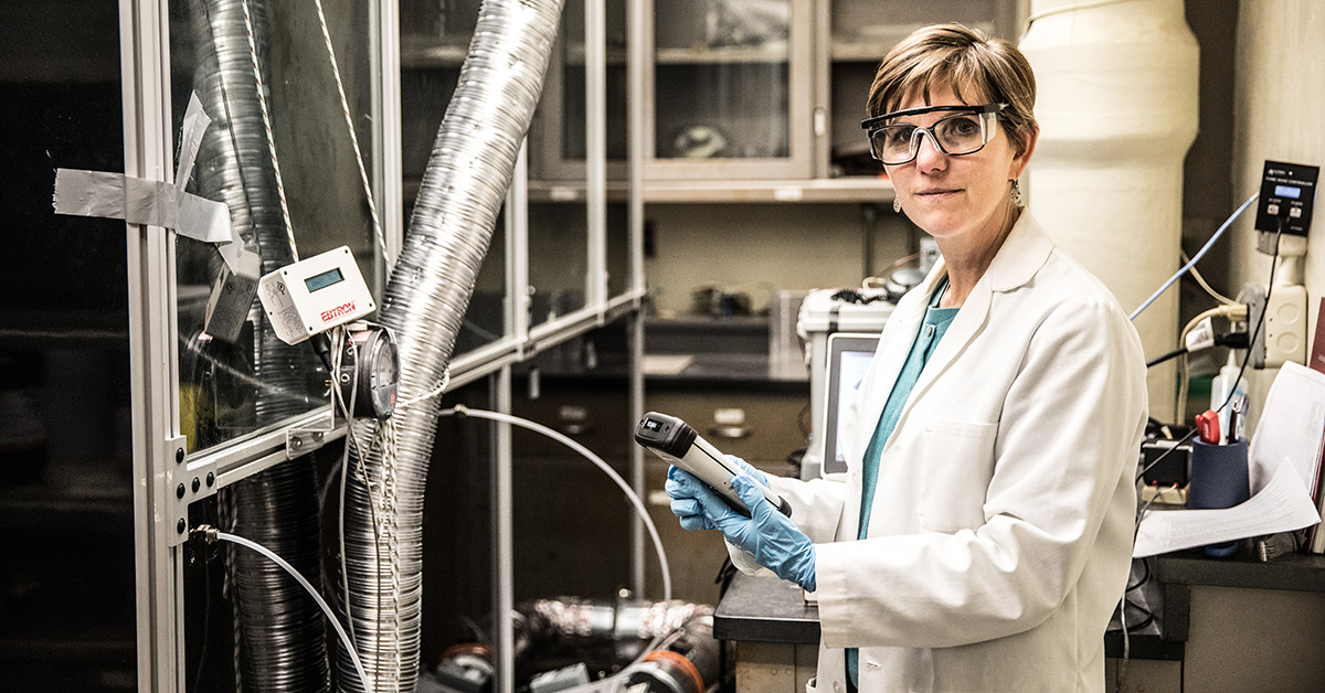 Susan Arnold working in an environmental exposures testing lab.