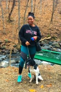 Lauren Jones and dog Jinx Jones on a fall hike in Bloomington, MN