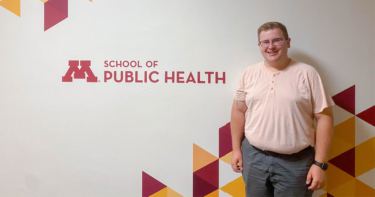 Bob Libal in front of School of Public Health sign