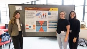 MPH student Gabbie Cesarone among fellow students Laura Farlow and Elena Tran at Research Day 2023