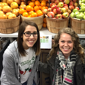 students Rebecca Leighton and Samantha Mosbrucker smiling