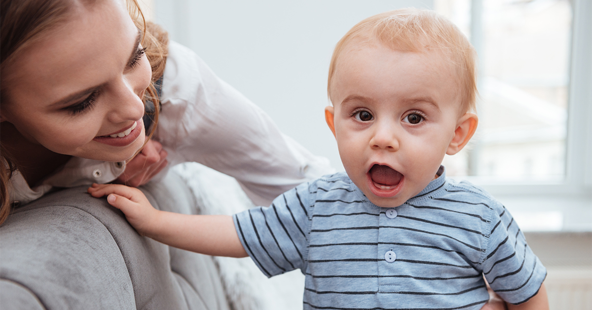 A mother and her toddler talking.