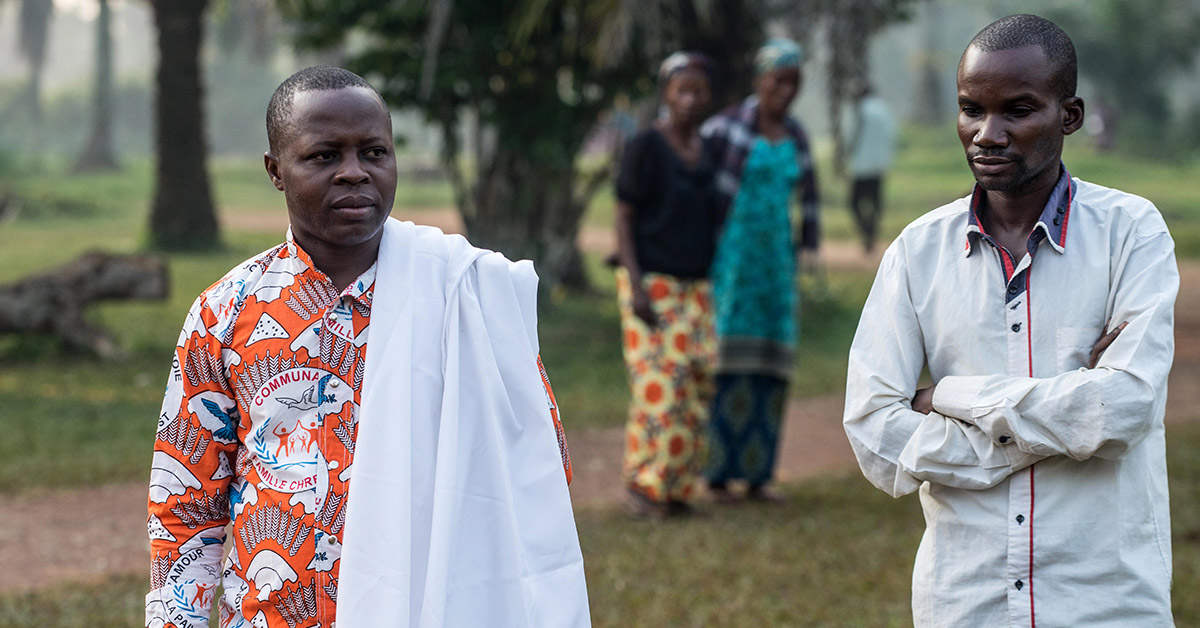 Ebola survivors walking outside.