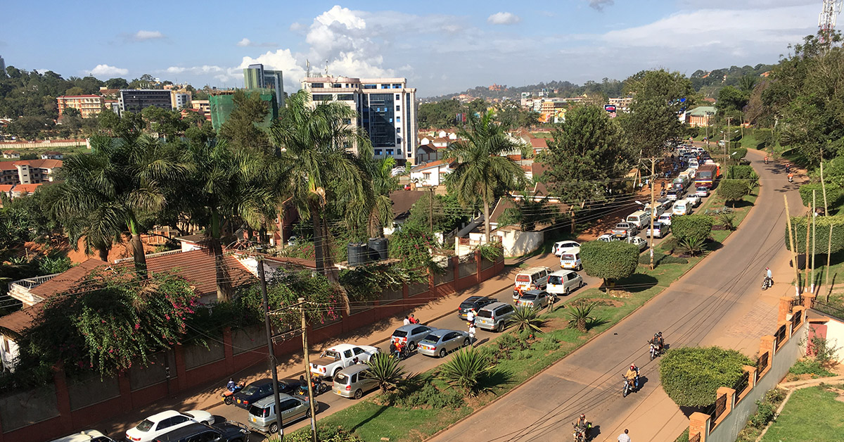 A city street and skyline in Kampala, Uganda.