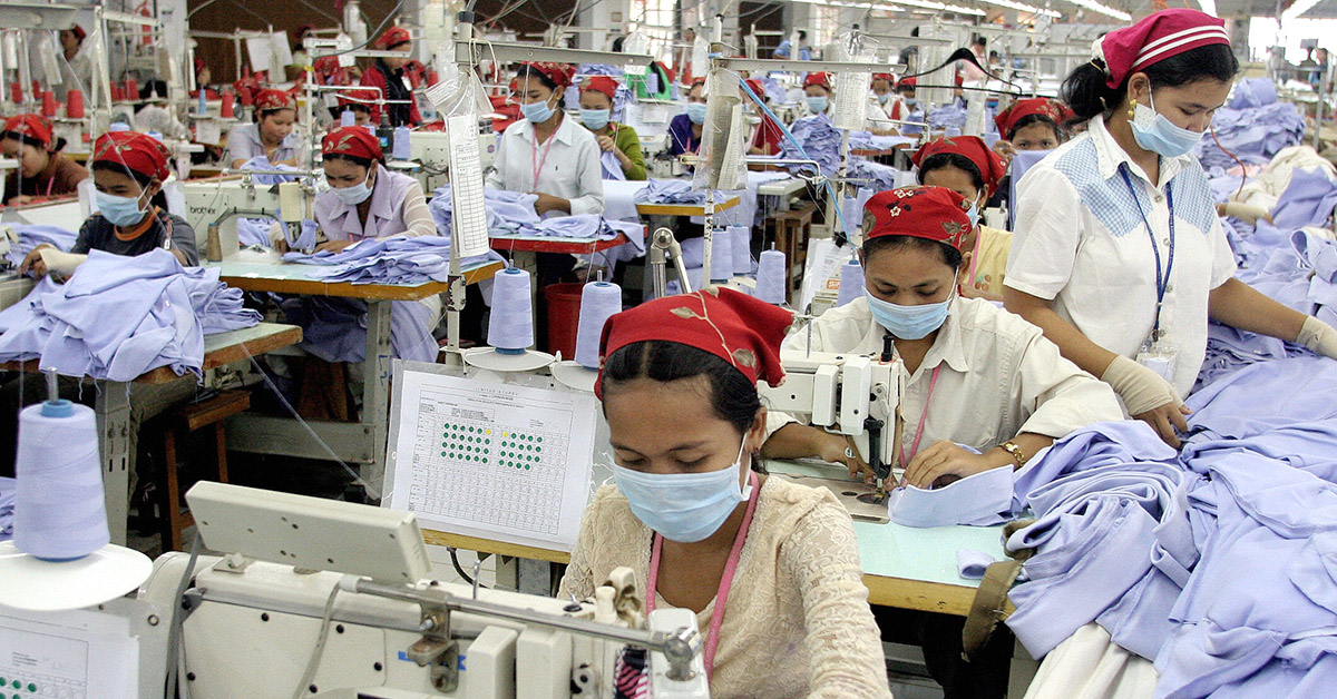 Cambodian women sewing in a garment factory.