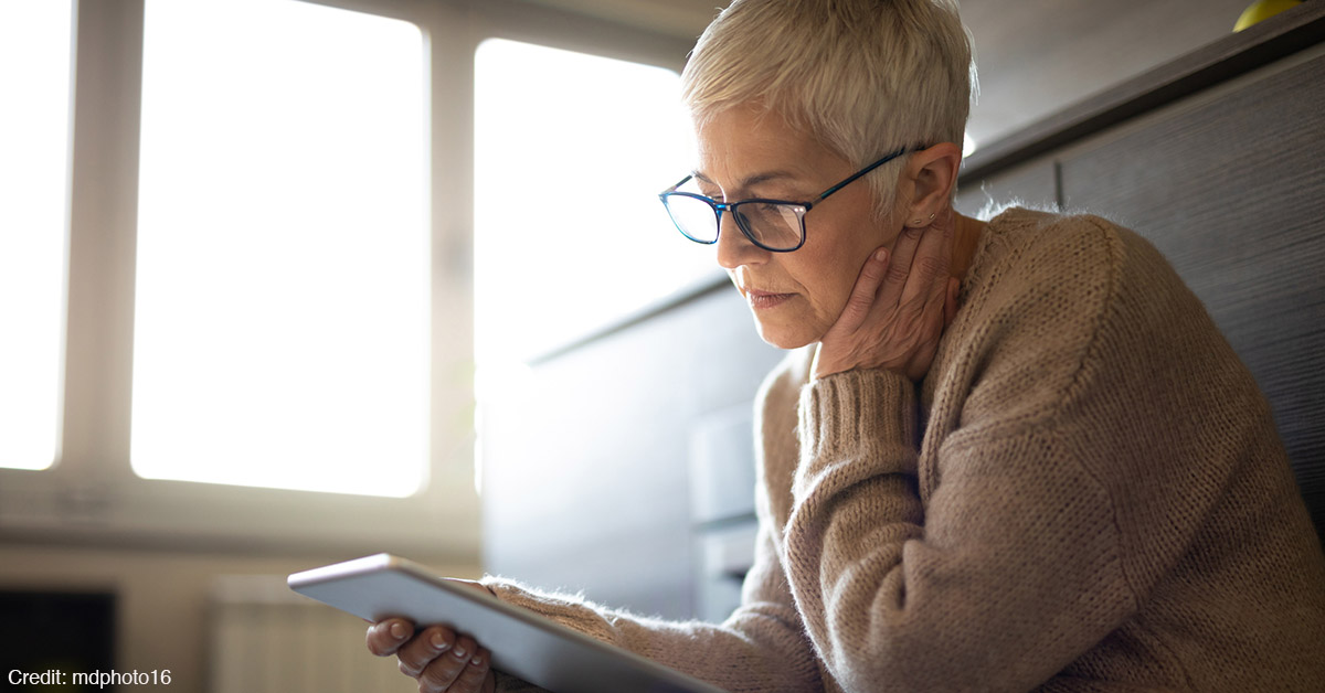 A woman using a tablet computer