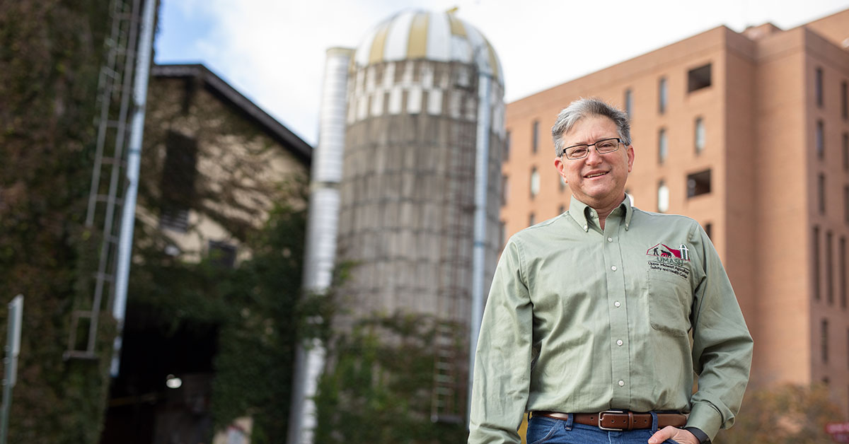Jeff Bender standing in front of a silo on the St. Paul campus.