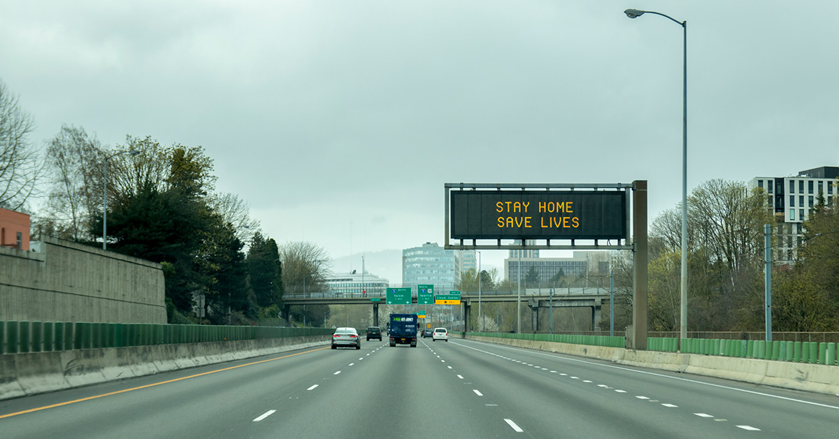 Cars driving down a highway.