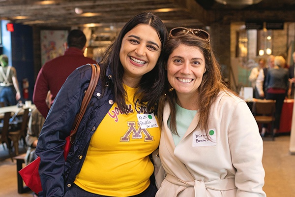 two people smiling