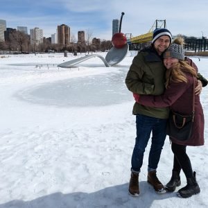 Katrina and Chris Saladin in front of an iconic Minneapolis statue