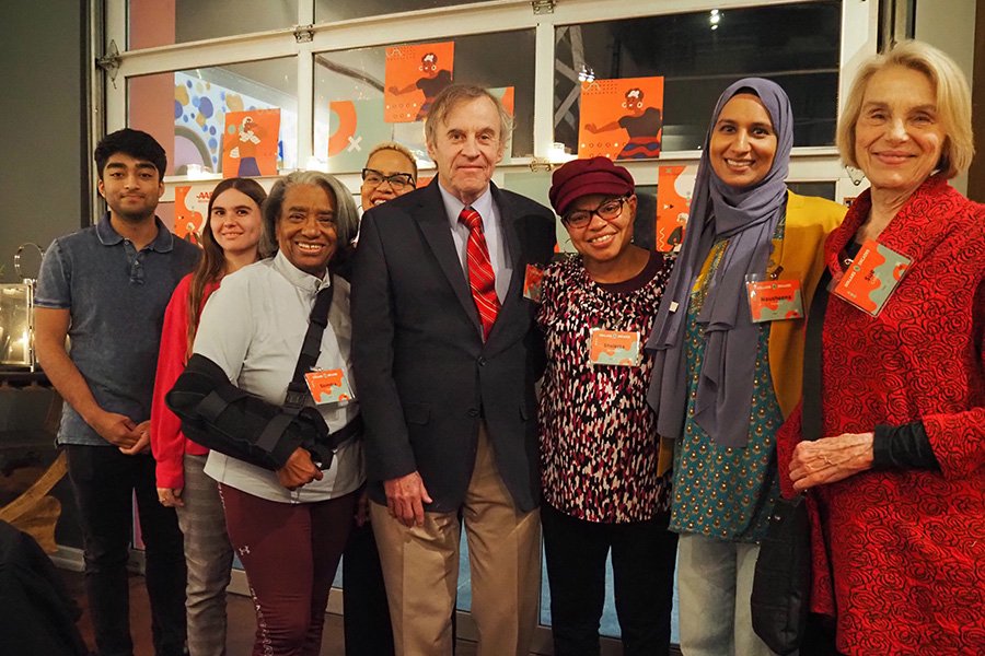 Eight ASIG social event participants posing for a picture