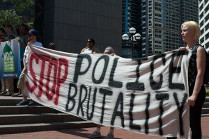 Protestors at a rally against police brutality in Minneapolis in 2013. (Source: Fibonacci Blue, Flikr Creative Commons)