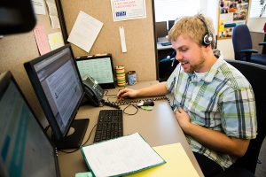 SPH student and Team D member Luke Magnuson conducts phone interviews.